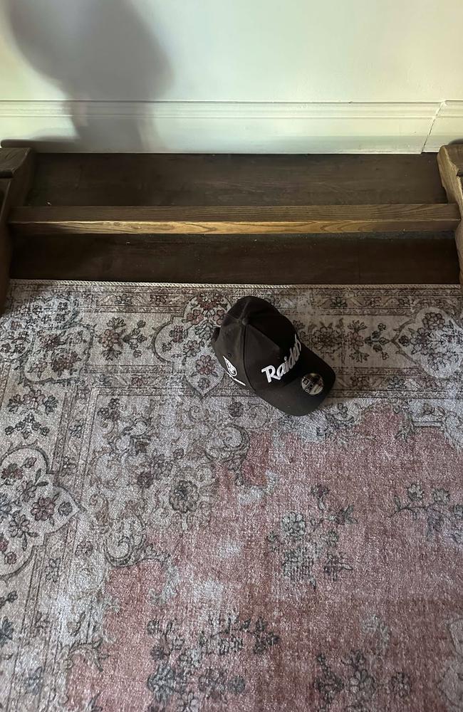 A hat which fell off the head of the person who broke into the store at 1am.
