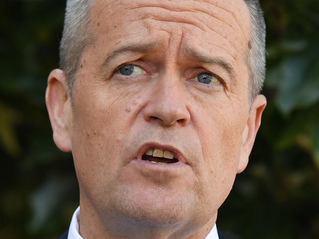 Federal Opposition Leader Bill Shorten looks on during a press conference following a visit to Logan Hospital south of  Brisbane, Monday, May 14, 2018. (AAP Image/Dave Hunt) NO ARCHIVING