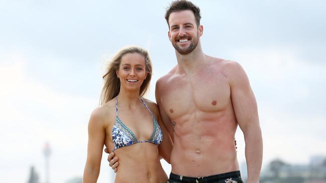 SUNDAY TELEGRAPH - Former Australian Olympic swimmer James Magnussen will be an ambassador for Royal Life Saving's Stay Safe Summer campaign. Pictured with girlfriend Rose McEvoy at Rose Bay beach. Picture: Toby Zerna