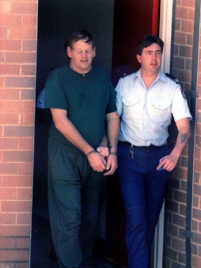 Reginald Arthurell is led from court in Dubbo. Picture: Marc Vignes