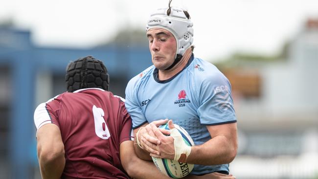 Toby Brial treasuring the ball. Picture: Julian Andrews