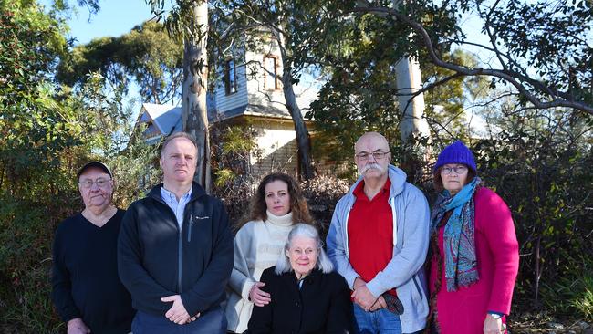 Rosanna residents Darryl Fitzgerald, Andrew Becker, Caroline Everett, Marie Broadway, Ross Spirou and Jenny Fletcher are petitioning to get Arden Chase heritage listed Picture: Josie Hayden