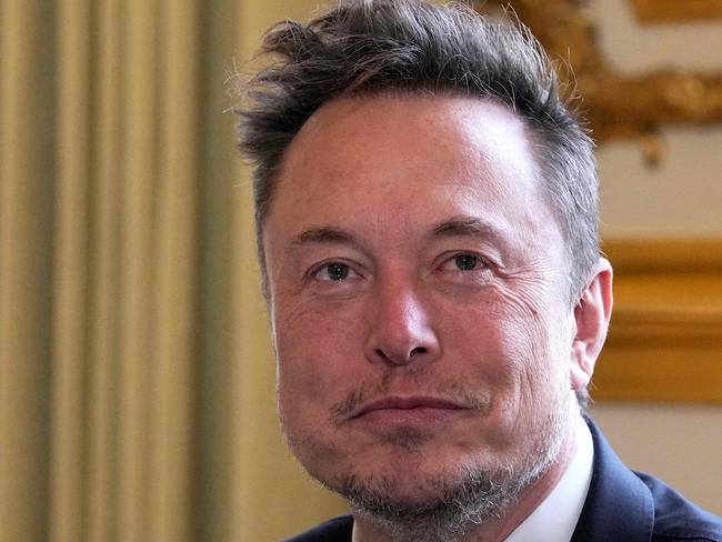 (FILES) SpaceX, Twitter and electric car maker Tesla CEO Elon Musk meets with France's President at the Elysee presidential palace in Paris on May 15, 2023. Elon Musk's start-up Neuralink on May 25, 2023 said it has gotten approval from US regulators to test its brain implants in people. Neuralink said clearance from the US Food and Drug Administration for its first in-human clinical study is "an important first step" for its technology, which is intended to let brains interface directly with computers. (Photo by Michel Euler / AFP)