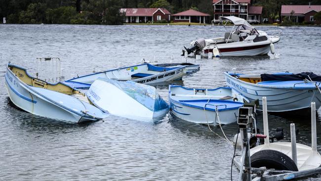 Boats were overturned after the wild storms on Sussex Inlet. Picture: Darren Leigh Roberts