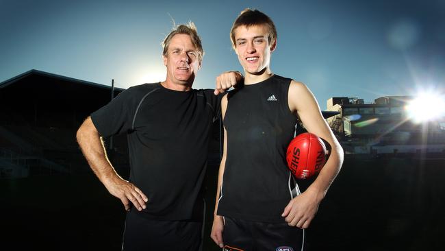 Collingwood great Peter Moore and his 16 year old son Darcy at Victoria Park.