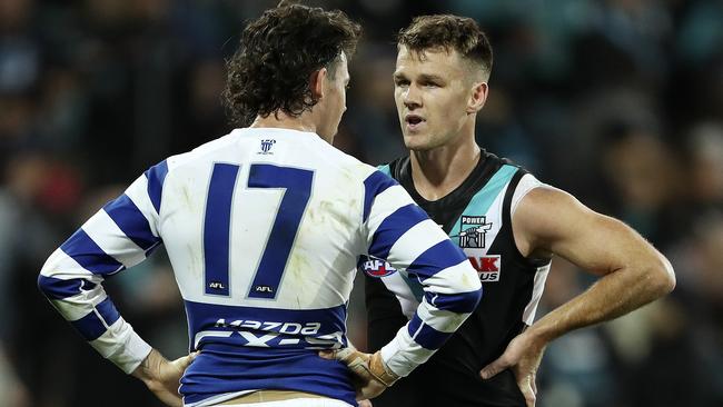 Robbie Gray talks with former teammate Jasper Pittard after the game. Picture SARAH REED