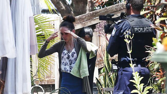 Forensic police and plain clothes detectives investigate the death of Makavelii Leoni. Leoni's mother Lina Daley helps police with their investigations. Picture: Brendan Radke.