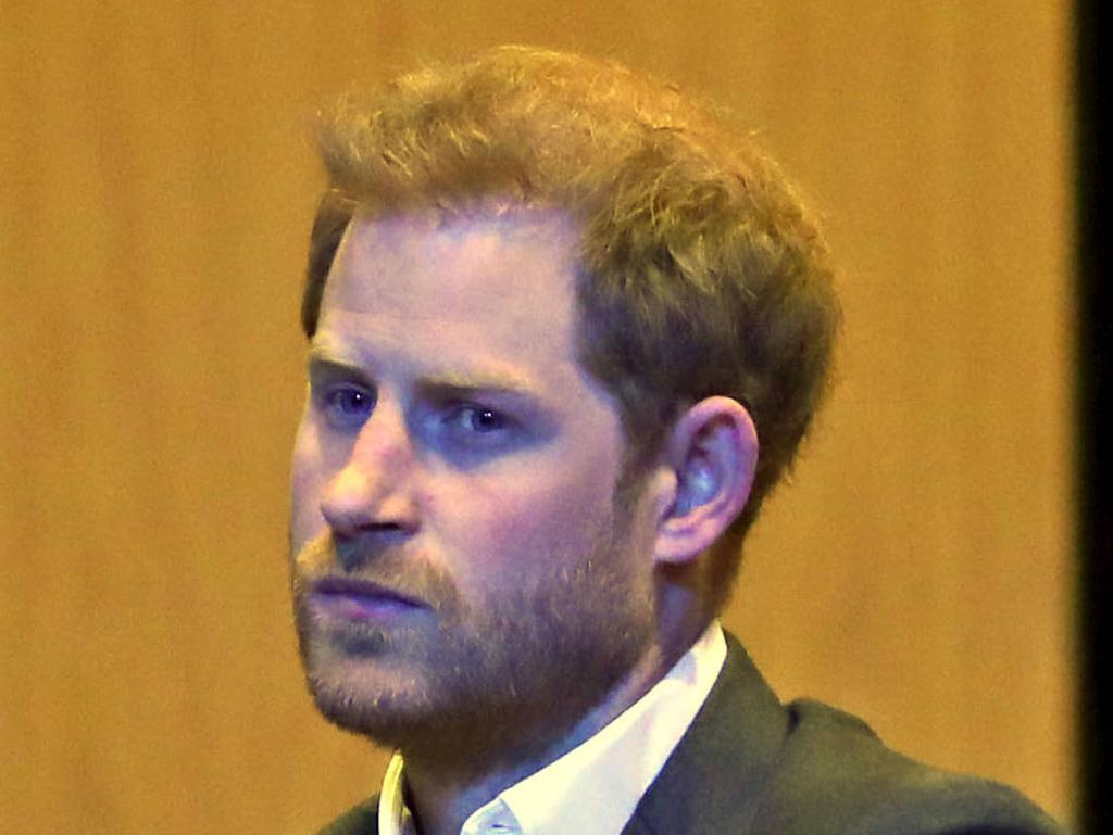 Prince Harry is back in the UK, and boy does he look happy about it. Picture: Andrew Milligan-WPA Pool/Getty Images