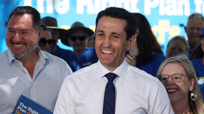 Opposition Leader David Crisafulli, centre, with LNP candidates Kendall Morton, right, and Andrew Powell. Picture: Liam Kidston