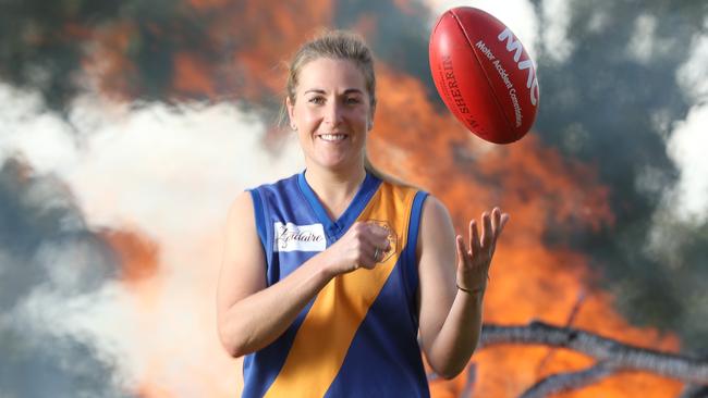 Casey McElroy, 27, was suspended from playing footy for daring to play on a men’s team. Picture: Tait Schmaal/News Corp Australia