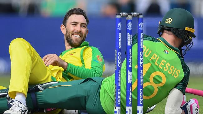 Australia’s Glenn Maxwell (left) as he and Faf du Plessis collide. Picture: AFP