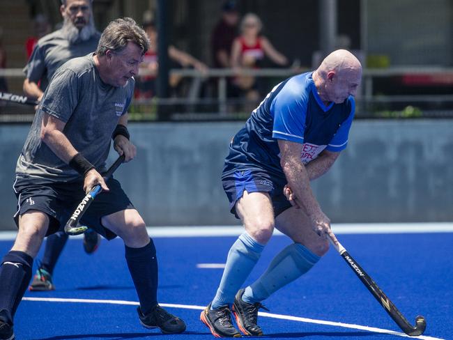 Darren Cook in the action in the Pan Pacific Masters Games Hockey tournament. Picture: Glenn Campbell