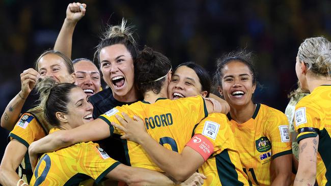 Teammates celebrate with Mackenzie Arnold after Australia beat France following an incredible shootout as part of the FIFA World Cup, in Brisbane in 2023. Picture: Adam Head