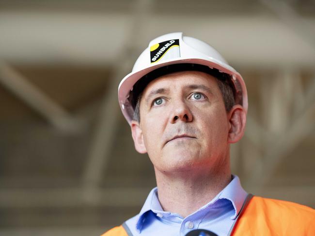 It takes more than a hard hat to survive what falls on you in politics. Chief Minister Michael Gunner relies on many spin doctors to lesson the debris. Picture: Keri Megelus