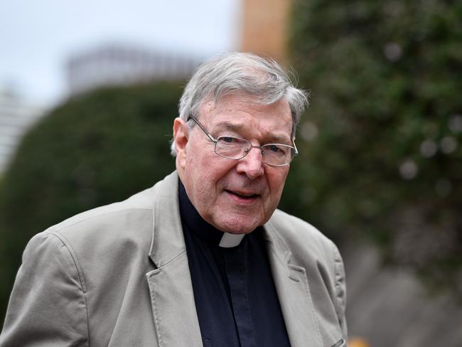 Cardinal George Pell is seen outside St Mary's Cathedral in Sydney, Friday, December 15, 2017. Rev. Anthony Fisher is set to make a statement following the release of the final report into the Royal Commission into Institutional Responses to Child Sexual Abuse. (AAP Image/Joel Carrett) NO ARCHIVING