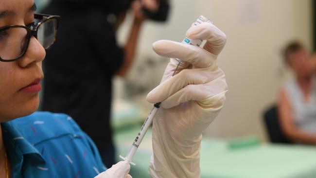 Chief Minister Michael Gunner receives the first dose of the coronavirus vaccine, Picture Katrina Bridgeford.