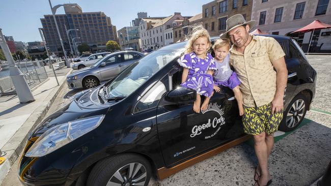 Good Car Company co-founder Anthony Broese van Groenou and his children with their Nissan Leaf at Hobart. Picture: Chris Kidd