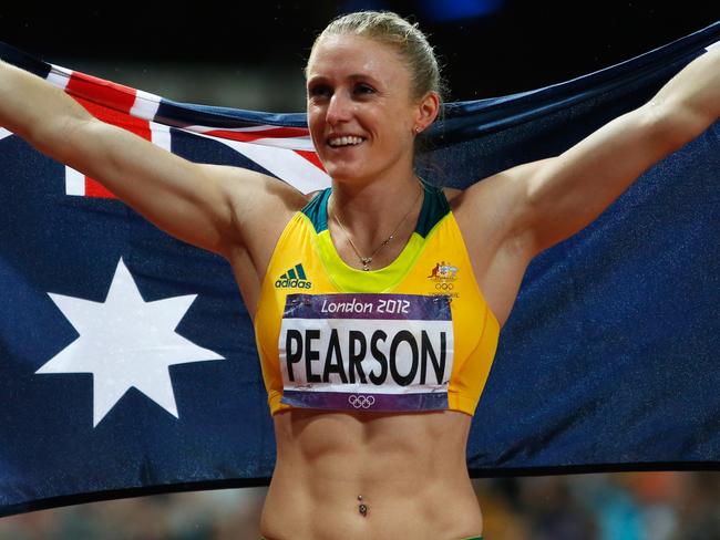 LONDON, ENGLAND - AUGUST 07:  Sally Pearson of Australia celebrates after winning the gold medal in the Women's 100m Hurdles Final on Day 11 of the London 2012 Olympic Games at Olympic Stadium on August 7, 2012 in London, England.  (Photo by Jamie Squire/Getty Images)