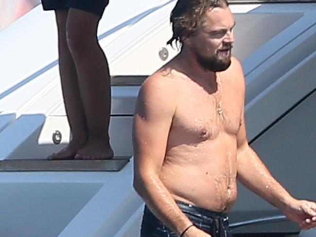 ONE TIME WEB USE ONLY - FEE APPLIES FOR REUSE - AU_1619556 - ** RIGHTS: ONLY AUSTRALIA, NEW ZEALAND ** Saint-Tropez, FRANCE  - Actor Leonardo DiCaprio and his girlfriend Toni Garrn enjoy an afternoon on their yacht off the coast of Saint-Tropez, France on July 24, 2014. The couple went for a swim together, then rinsed off on the boat before heading to the top deck to dry off in the sun. Leo is sporting a bit of pudge around his mid section these days.  Pictured: Leonardo DiCaprio  BACKGRID Australia 24 JULY 2014   Phone: + 61 419 847 429 Email:  sarah@backgrid.com.auPicture: Backgrid