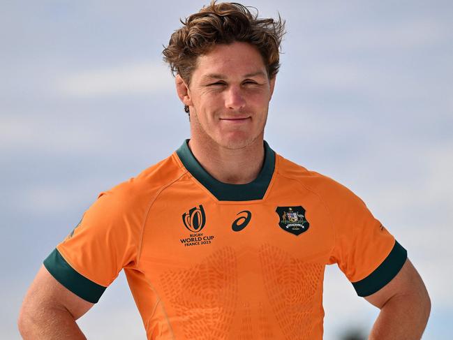 (FILES) Australiaâs Michael Hooper poses during the 2023 Rugby World Cup jersey launch media event in Sydney on June 22, 2023. Michael Hooper, who holds the record for the most caps as Australia captain, put an end to his international rugby career on June 30, 2024, after missing out on selection for the Paris Olympics.  The 32-year-old, who played 125 Tests for the Wallabies - 69 of them as skipper - announced his immediate retirement on social media. (Photo by Saeed KHAN / AFP) / -- IMAGE RESTRICTED TO EDITORIAL USE - STRICTLY NO COMMERCIAL USE --