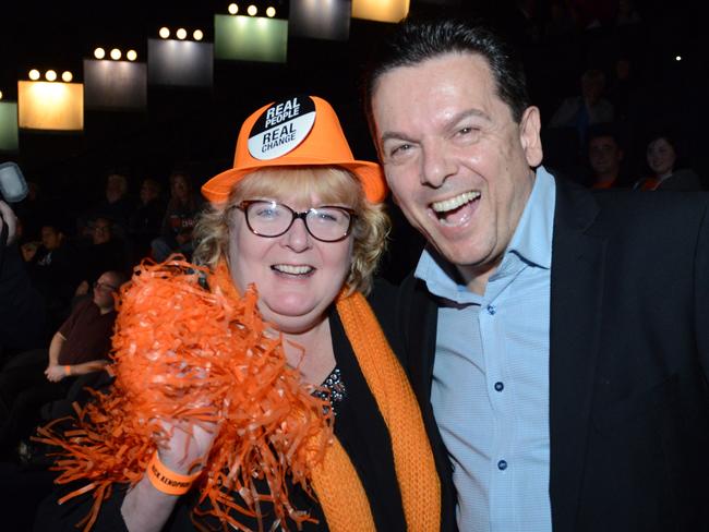 Nick Xenophon, pictured with a supporter, is another big winner in the Senate. Picture: AAP Image/Brenton Edwards