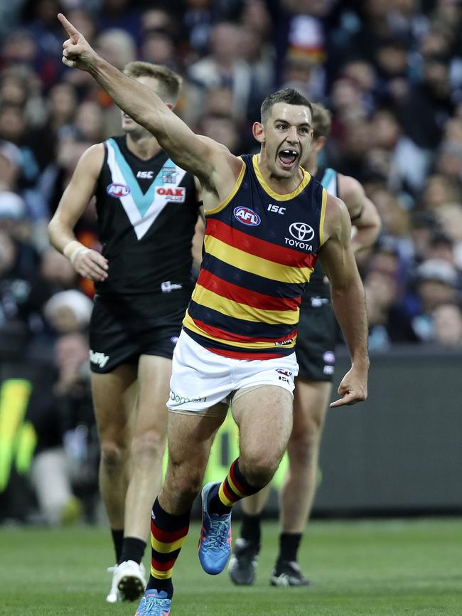 Crows captain Taylor Walker celebrates his big goal last-quarter goal in Showdown 44. He has struggled with injury and fitness after an interrupted preseason. Picture SARAH REED