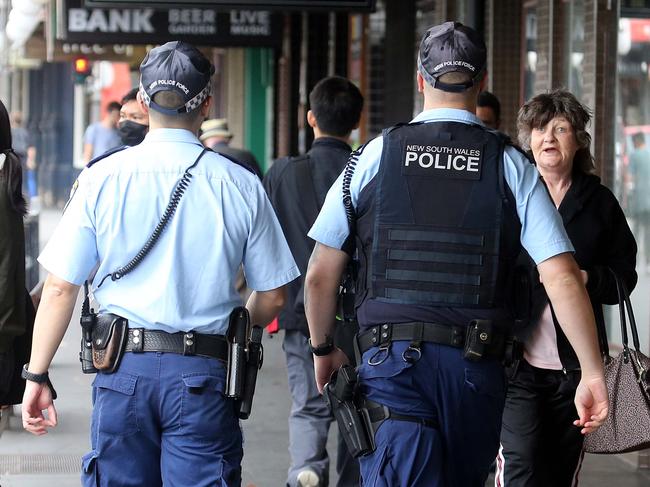 26 MARCH 2020 SYDNEY AUSTRALIA WWW.MATRIXPICTURES.COM.AU  EXCLUSIVE PICTURES    A decreased number of people wait at the Covid19 assessment facility at Randwick (eight in cue only) on Wednesday afternoon, as an increased Police presence is seen in Newtown today.   Note: All editorial images subject to the following: For editorial use only. Additional clearance required for commercial, wireless, internet or promotional use.Images may not be altered or modified. Matrix Media Group makes no representations or warranties regarding names, trademarks or logos appearing in the images.