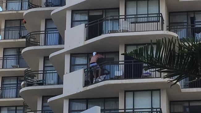 Schoolies on balconies in Surfers Paradise, the day after a young man lost his life. Photo: Tali Eley