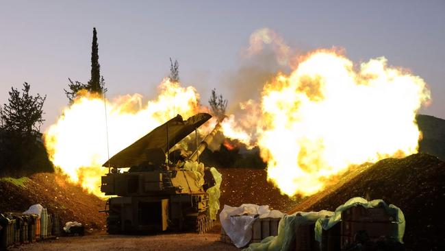 An Israeli artillery unit fires from a position in Upper Galilee in northern Israel towards southern Lebanon. Picture: AFP