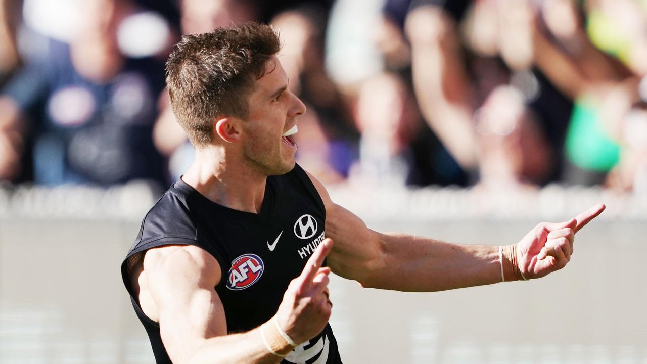 Marc Murphy celebrates a goal at the MCG on Saturday.