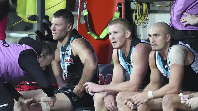 Brad Ebert after hurting his knee against Brisbane. Picture: Sarah Reed.