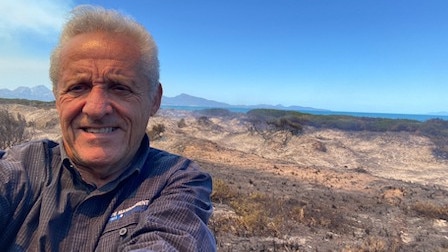 Dolphin Sands resident Harry Curry showing the scale of destruction around his property. Picture: Supplied