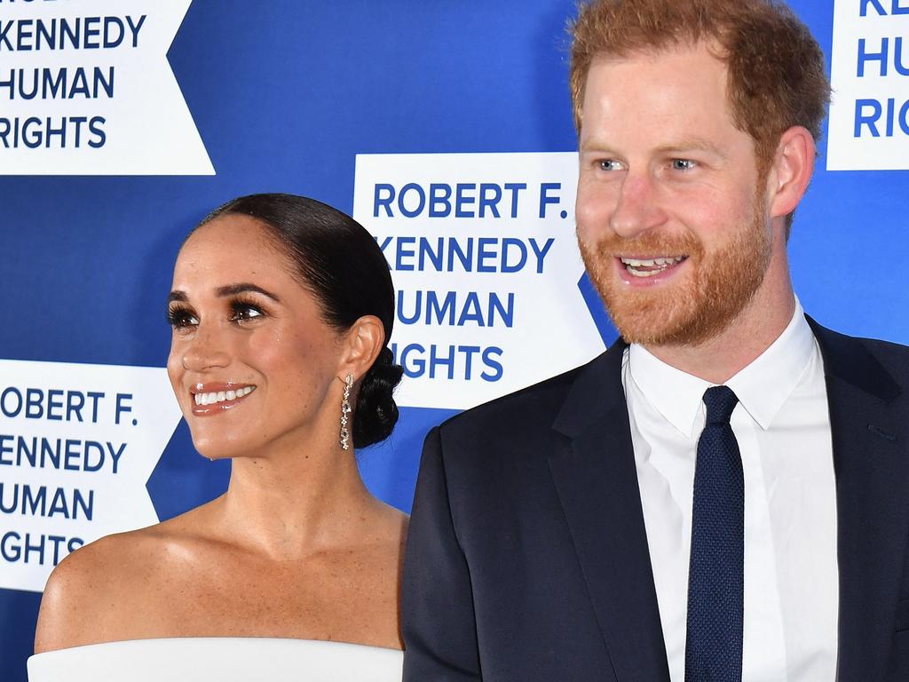 Prince Harry with wife Meghan Markle. Picture: AFP