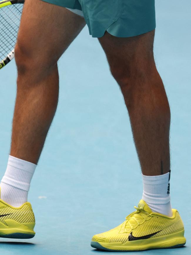 The Eiffel Tower tattoo can be seen poking out of Alcaraz’s sock on his left leg. Picture: DAVID GRAY / AFP