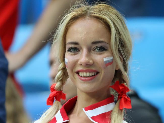 SAINT PETERSBURG, RUSSIA - JUNE 19:  A Russia fan enjoys the pre match atmosphere prior to  the 2018 FIFA World Cup Russia group A match between Russia and Egypt at Saint Petersburg Stadium on June 19, 2018 in Saint Petersburg, Russia.  (Photo by Richard Heathcote/Getty Images)