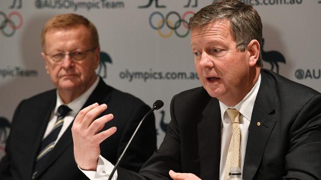 President of AOC John Coates, left, has backed Matt Carroll, right, to fix rugby Picture: AFP