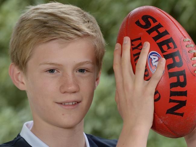 Flashback: Fischer McAsey after his selection in the Victorian primary schools football team.