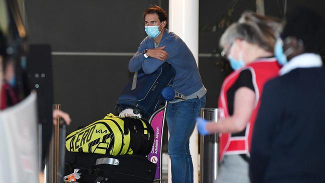 Rafael Nadal arrives at Adelaide Airport on January 14. All players and staff arriving in Adelaide for the Australian Open must complete 14 days of hotel quarantine before being able to compete in Adelaide and then to Melbourne for the Australian Open. Picture: Getty