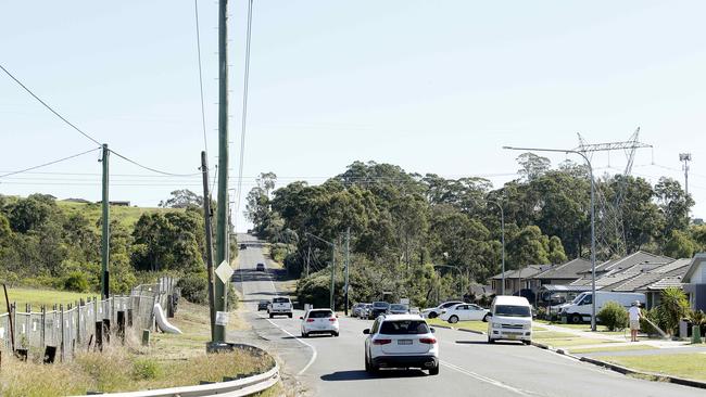 Fifteenth Ave on the edge of Middleton Grange is the only road in and out after the federal government pulled funding from upgrades. Picture: John Appleyard