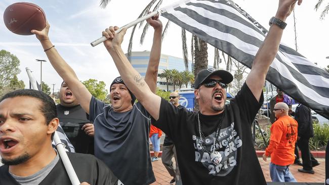 Raiders fans celebrating a proposed NFL football stadium by the owners of the San Diego Chargers and Oakland Raiders.
