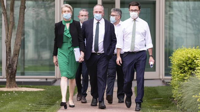 Bridget McKenzie, left, David Littleproud, Barnaby Joyce, Kevin Hogan and Keith Pitt walk to the Nationals Park Room in Parliament House, Canberra, on Thursday. Picture: Gary Ramage