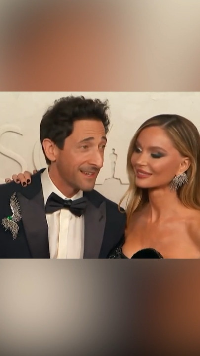 Adrian Brody and his wife arrive to the Oscars