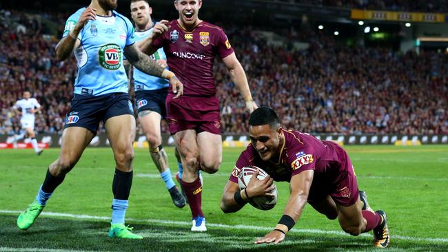 That’s a double ... Valentine Holmes scores his second try following a pinpoint Cooper Cronk kick. Photo: Adam Head