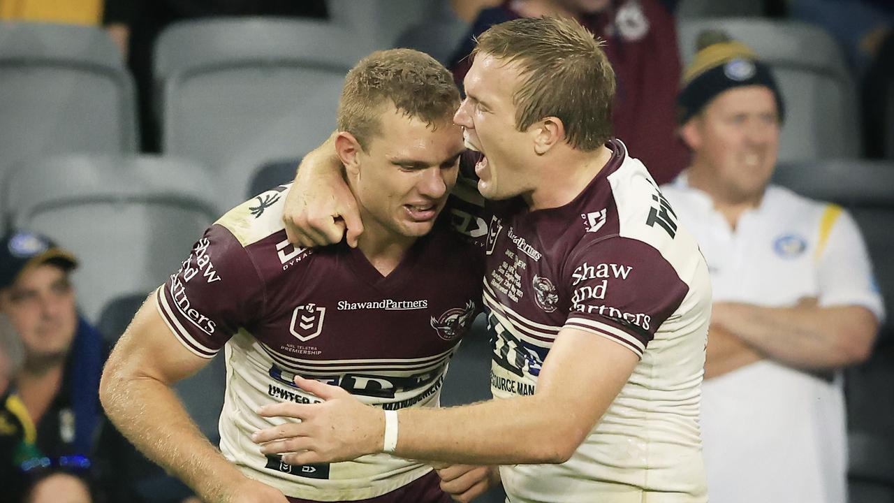 SYDNEY, AUSTRALIA - MAY 23: Tom and Jake Trbojevic of Manly celebrate their win during the round 11 NRL match between the Parramatta Eels and the Manly Sea Eagles at Bankwest Stadium, on May 23, 2021, in Sydney, Australia. (Photo by Mark Evans/Getty Images)