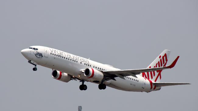 The Queensland government was keeping quiet on Tuesday as news that Virgin would remain in the state emerged.