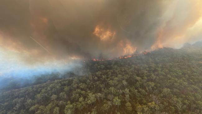 QFES aircrews captured this photos of a bushfire burning at Deepwater on Sunday where several properties were evacuated and some roads closed.