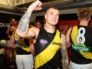 BRISBANE, AUSTRALIA - APRIL 16:  Dustin Martin of the Tigers celebrates winning the round four AFL match between the Brisbane Lions and the Richmond Tigers at The Gabba on April 16, 2017 in Brisbane, Australia.  (Photo by Chris Hyde/Getty Images)