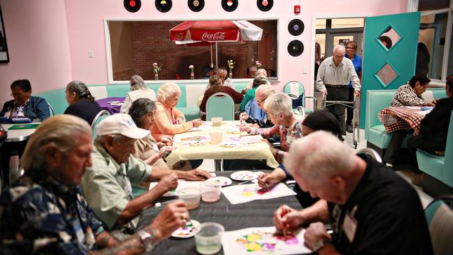 Visitors take a painting class at Rosie's Diner. Picture: The Wall Street Journal.