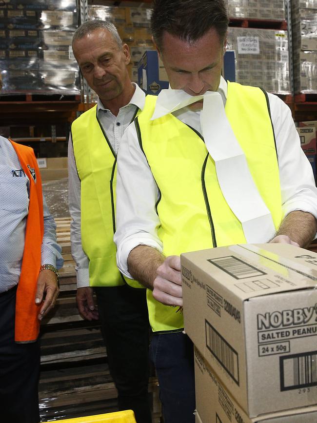 Mick Maroney pictured with premier-elect Chris Minns at JB Metropolitan Distribution in Moorebank to announce their plan to end the secrecy around toll road contracts. Picture: John Appleyard