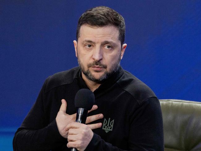 Ukraine's President Volodymyr Zelensky speaks during a joint press conference on the sidelines of the "Ukraine. Year 2025" forum in Kyiv on February 23, 2025, amid the Russian invasion of Ukraine. (Photo by Tetiana DZHAFAROVA / AFP)